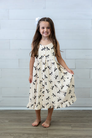 Girls Ivory Dress with Black Bows
