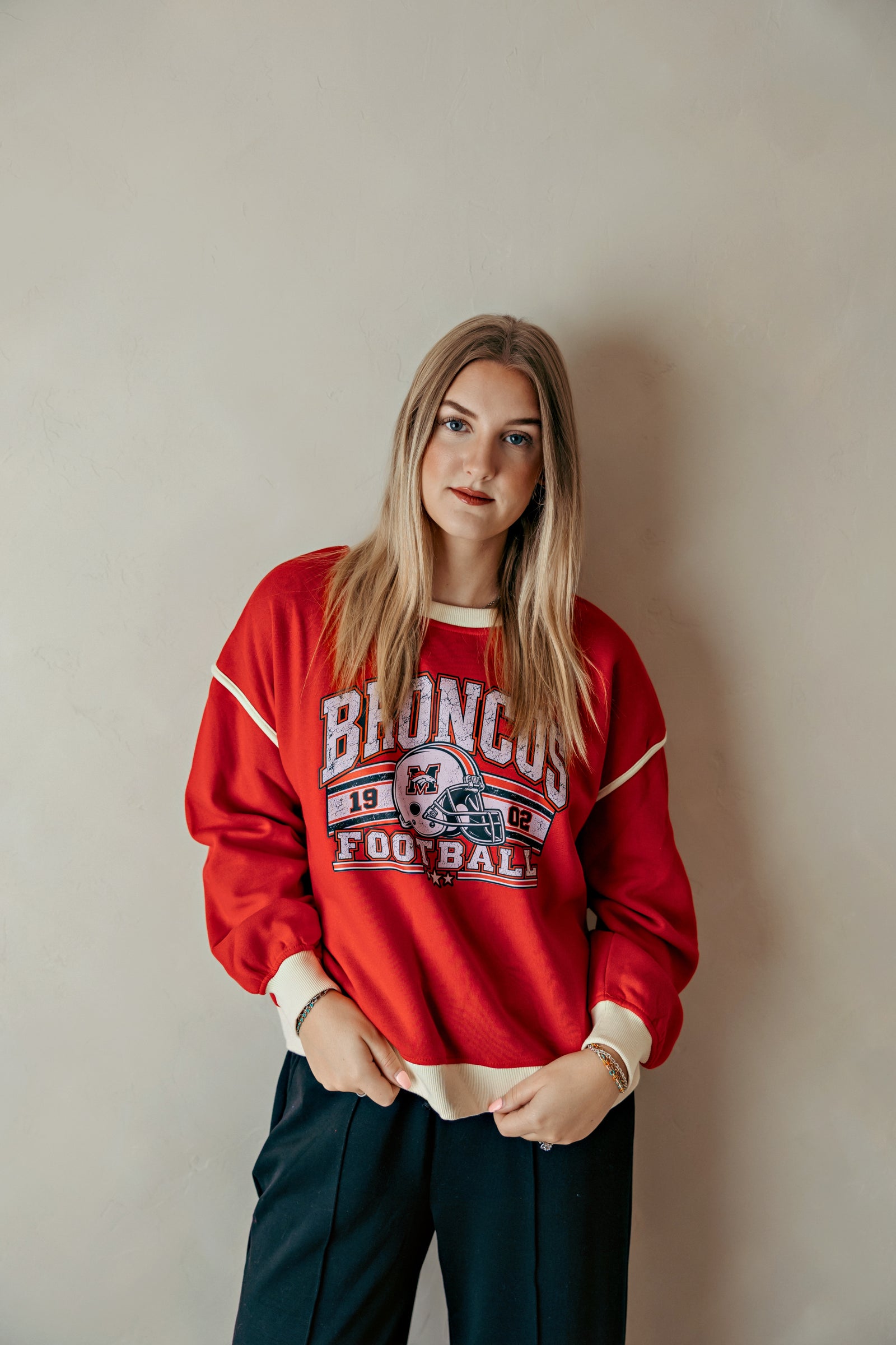 Broncos Vintage Football Helmet Sweatshirt Ruby