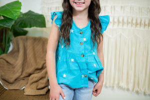 Girl's Blue Ruffle Top With Flowers
