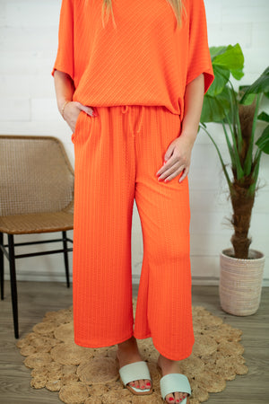 Neon Orange Cropped Knit Pants