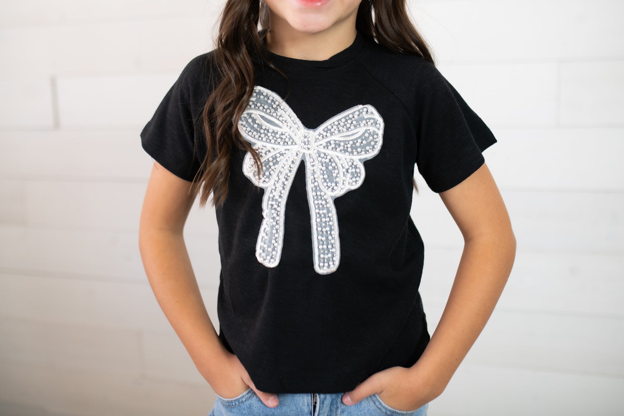 Hayden Girls SS Black Top with Pearl Bow