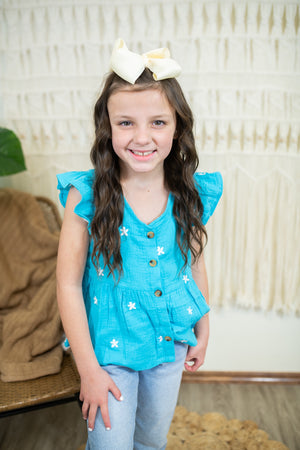 Girl's Blue Ruffle Top With Flowers